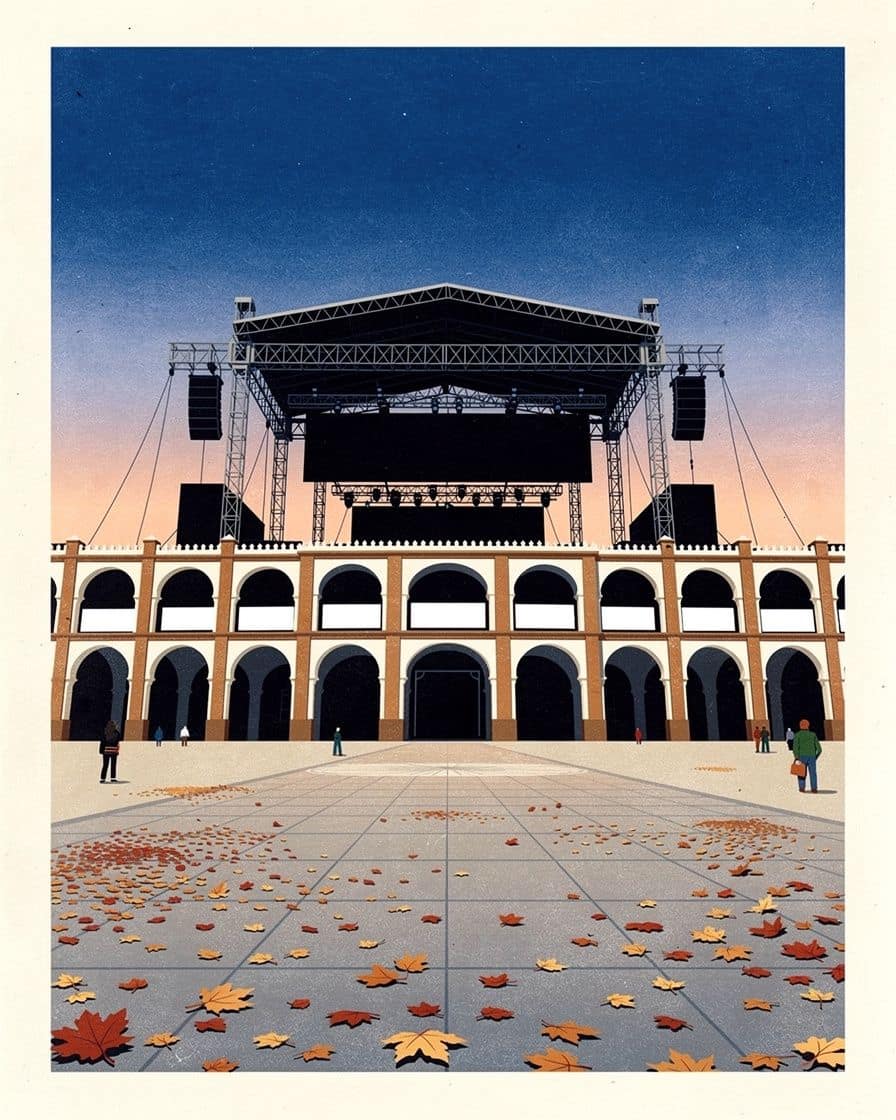 Open esplanade on the Isla de la Cartuja in Seville with the structures of an outdoor concert venue, in daylight