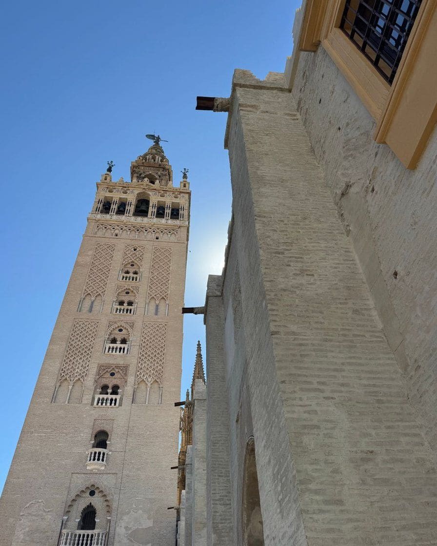 Inside ramp of the Giralda in Seville, a sloping brick passage lit by a single window