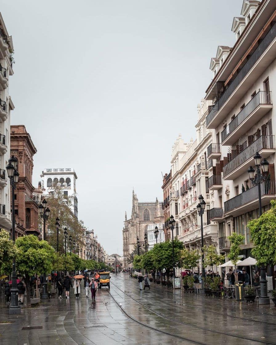 Façade of the Gran Poder basilica on the Plaza de San Lorenzo in Seville, mid-morning, with the square almost empty